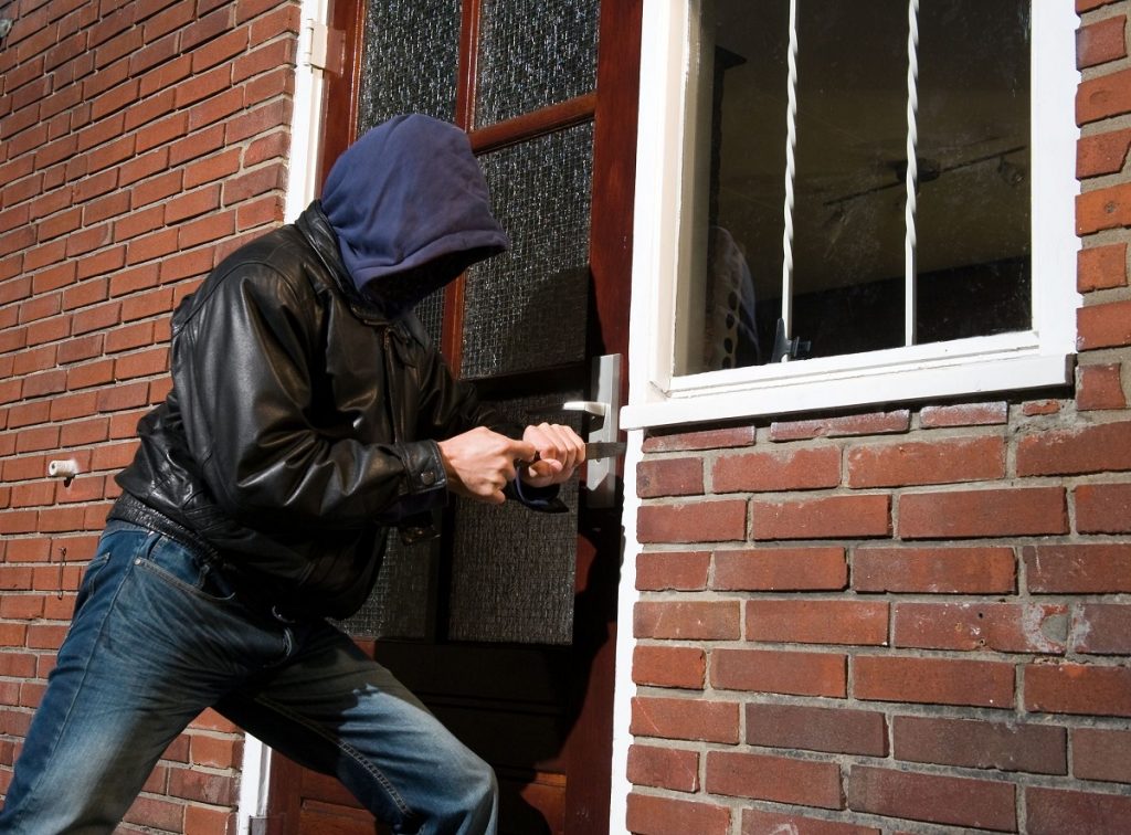 Burglar breaking into a house Home Burglary